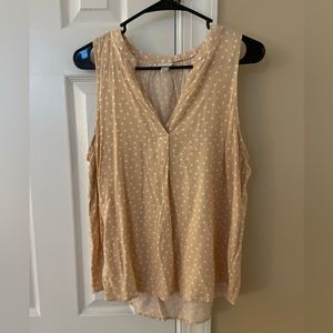 Pale pink polka dotted sleeveless blouse